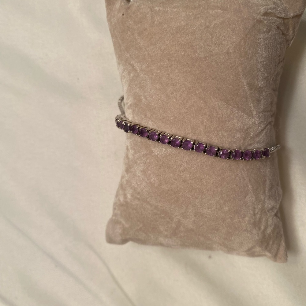 Sterling sliver bracket with purple stones